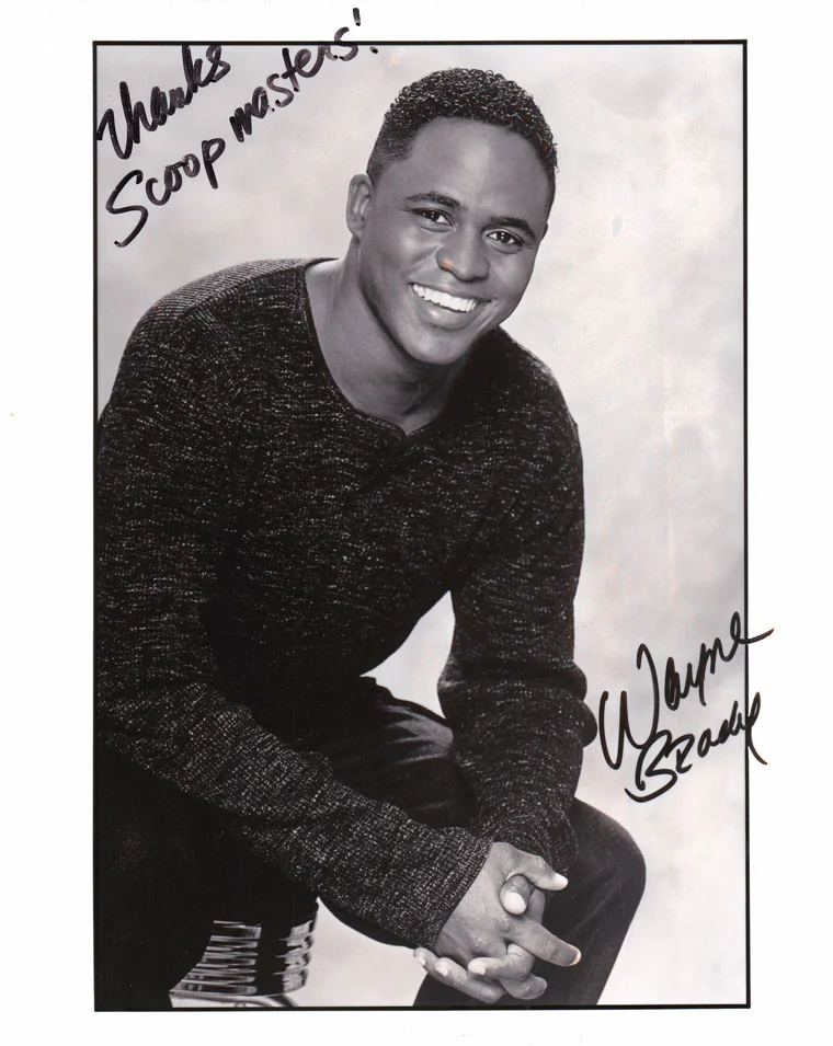 signed gallery image of wayne brady for scoop masters dog poop pick up service